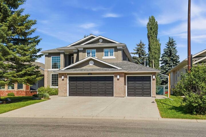 Property Photo: 12078 Diamond View SE AB T2J 7B2