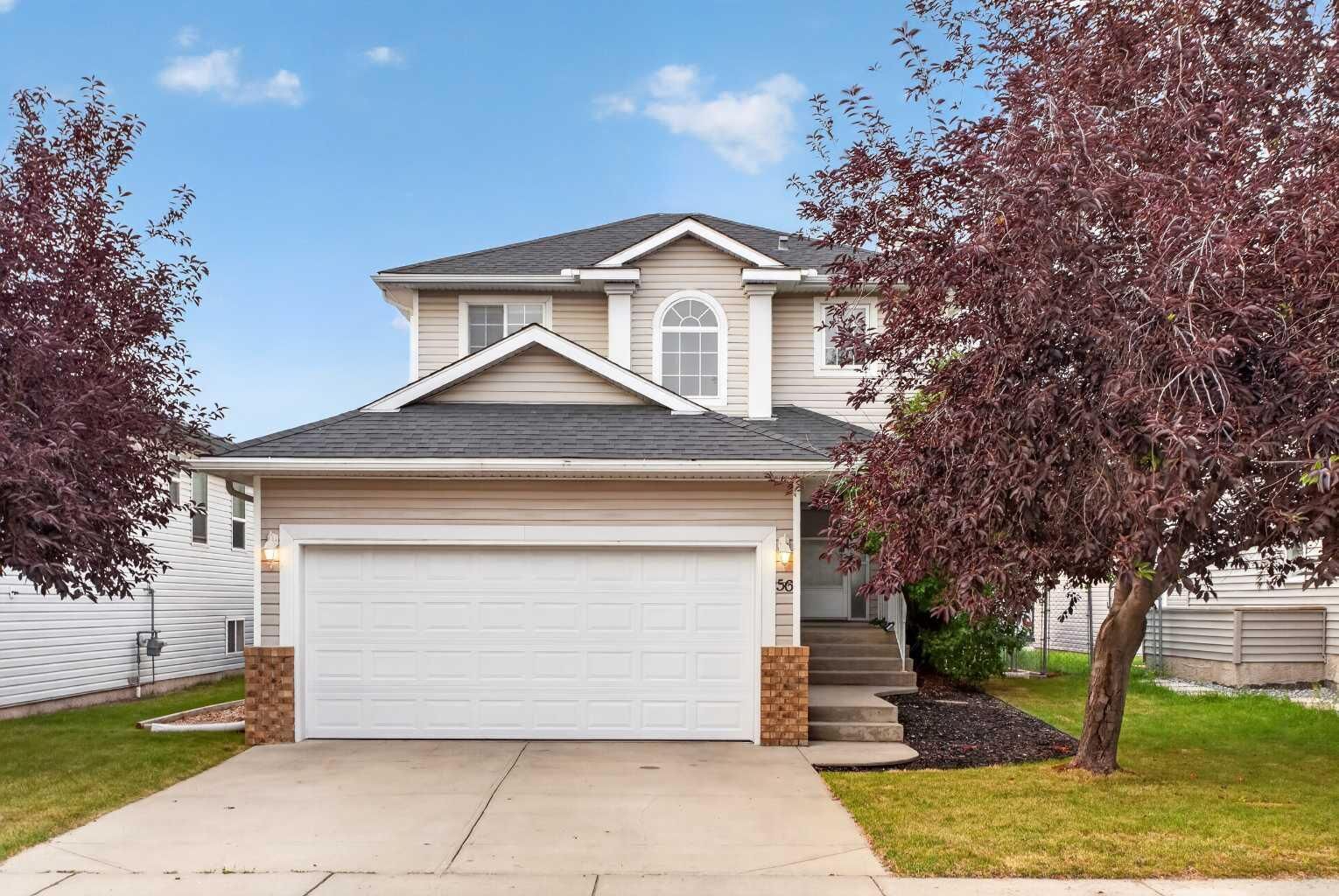 Property Photo: 56 Silver Creek Boulevard AB T4B 2P6