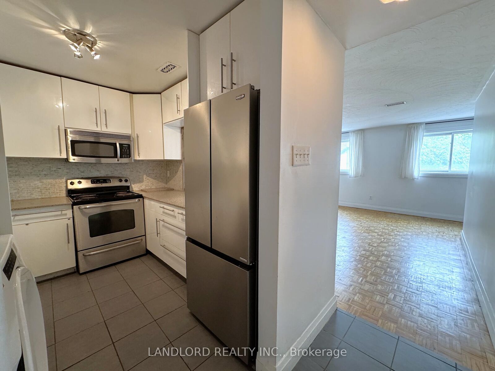 Property Photo:  1175 Queen Street E B  ON M4M 1L5 