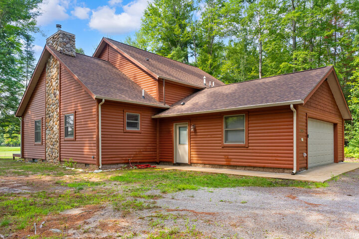 Property Photo:  20915 East Riverside Drive  MI 49746 