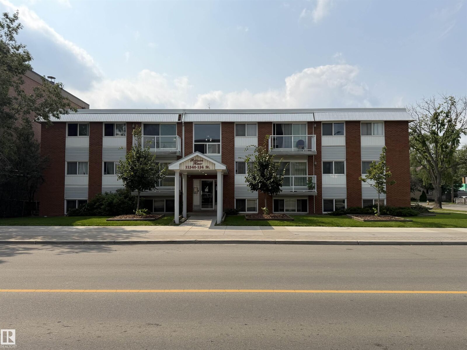Property Photo: 11340 124 Street NW 306 AB T5M 0K1