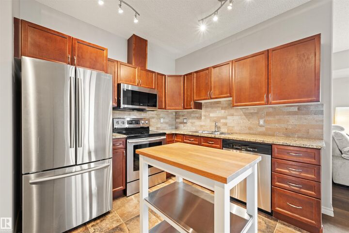 Property Photo:  10319 111 Street NW 904  AB T5K 0A2 
