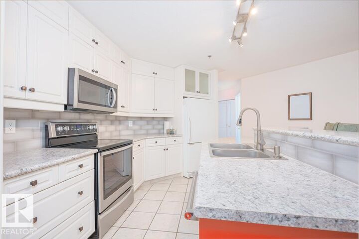 Property Photo:  12028 103 Avenue NW 108  AB T5K 2T9 