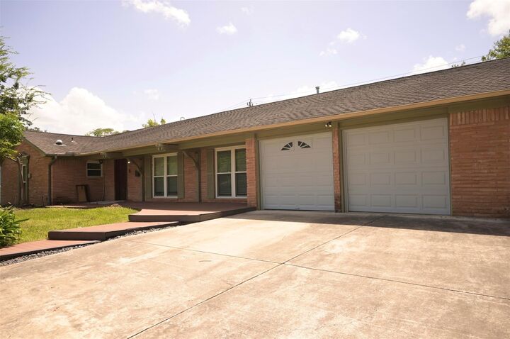 Property Photo:  9810 Cliffwood Drive  TX 77096 
