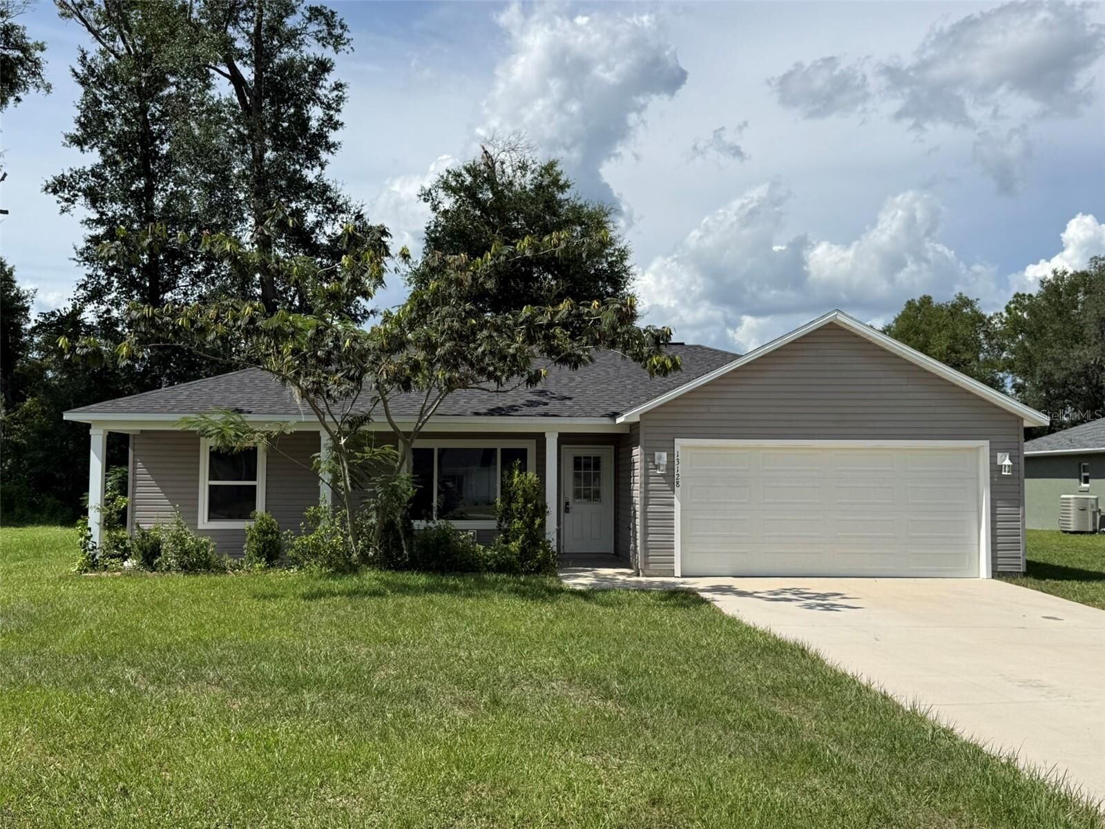 Property Photo: 13128 NE 7th Loop FL 34488