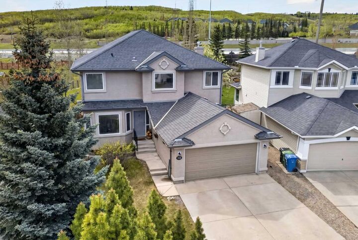 Property Photo: 112 Valley Stream Close NW AB T3B 5V8