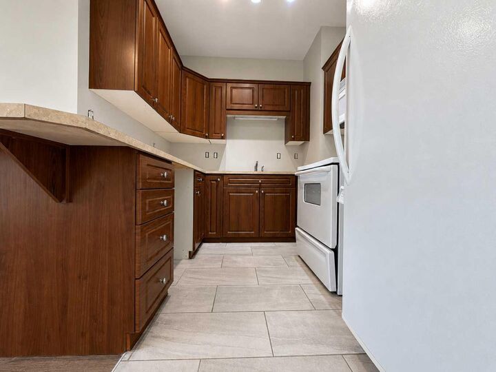 Property Photo: 9229 Lakeland Drive 208 AB T8X 0B8