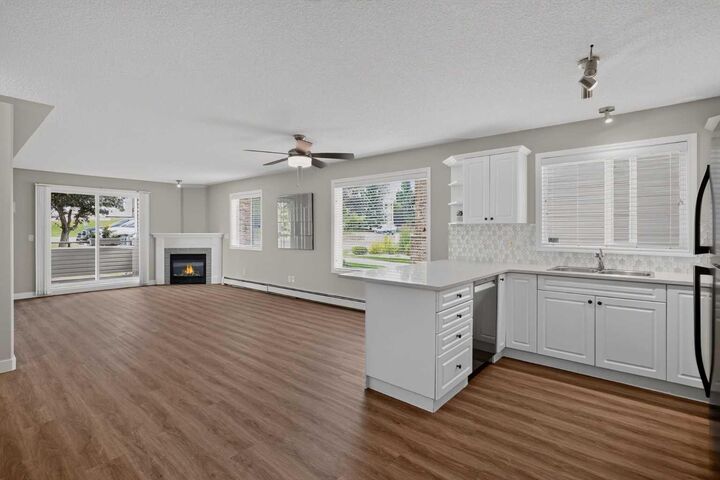 Property Photo:  7451 Springbank Boulevard SW 2114  AB T3H 4K5 