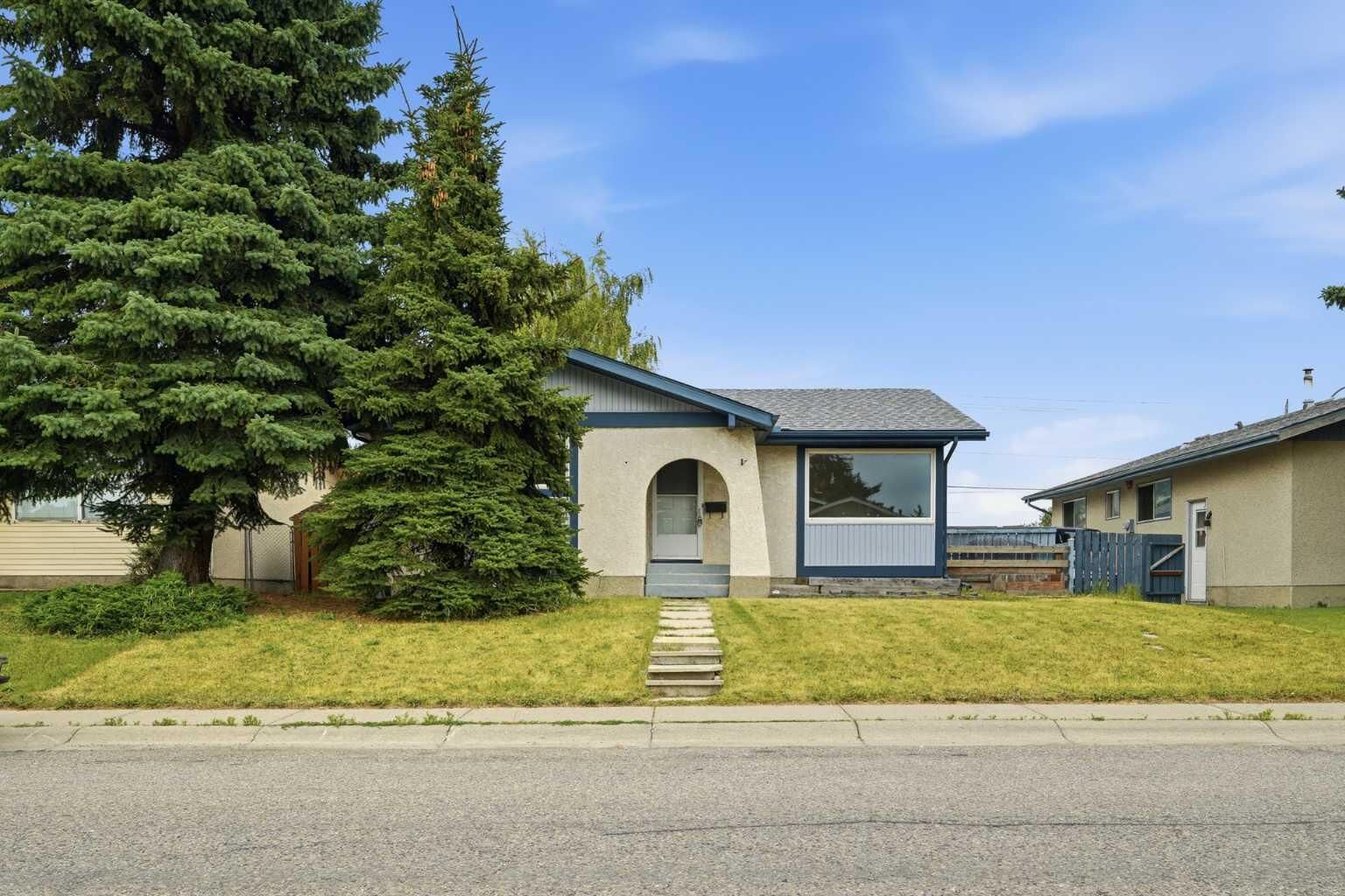 Property Photo: 1211 Maitland Drive NE AB T2A 5K2
