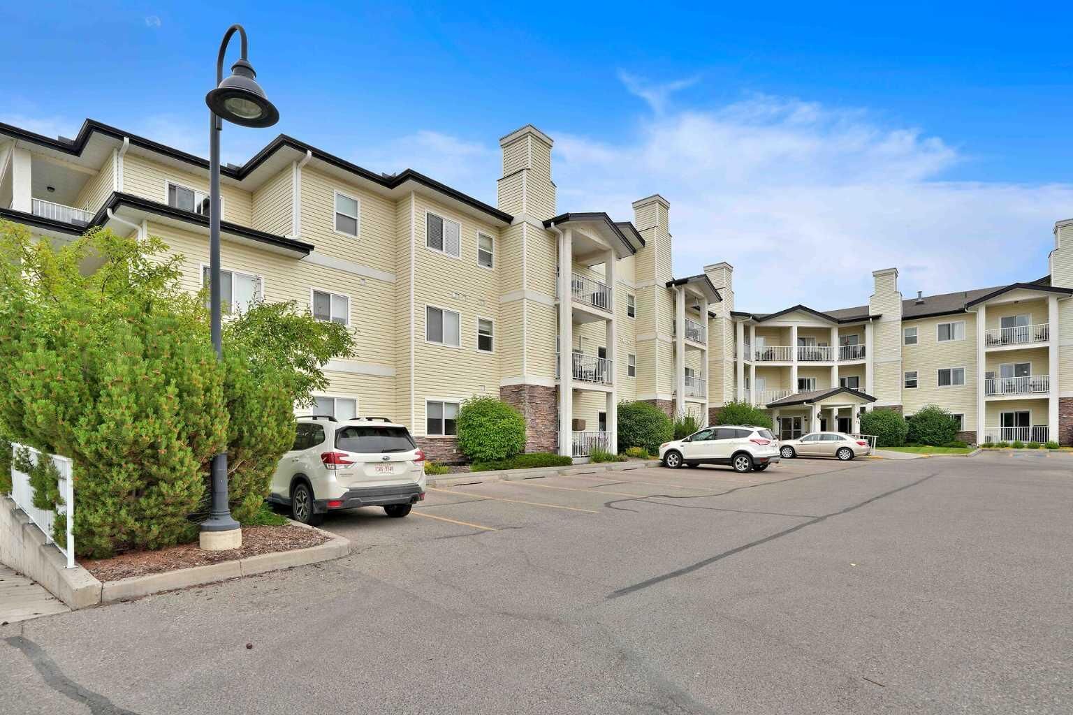 Property Photo: 72 Quigley Drive 115 AB T4C 2K6