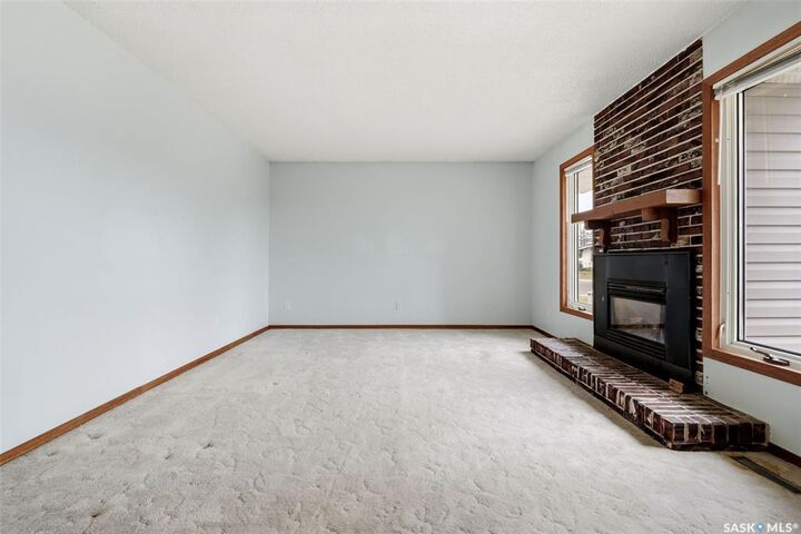 Property Photo:  65 McCaul Crescent  SK S4R 3X3 