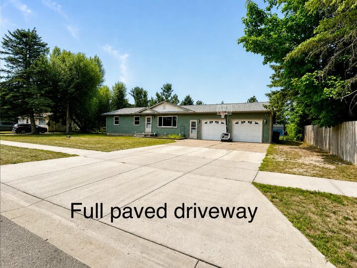Property Photo:  809 Clover Drive  MI 49735 