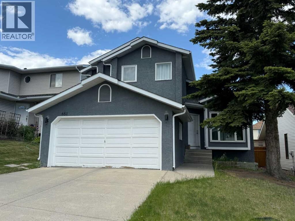 Property Photo: 651 Macewan Drive Northwest AB T3K 3R1