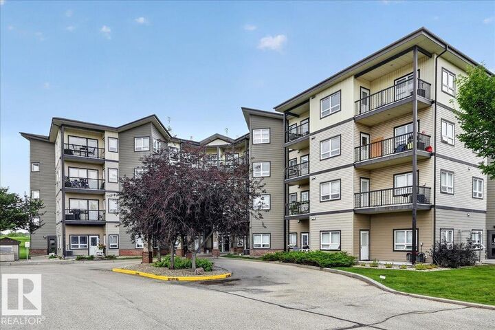Property Photo: 8702 Southfort Drive 306 AB T8L 4R6