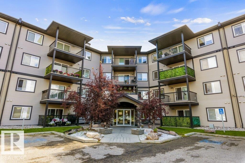 Property Photo:  5951 165 Avenue NW 203  AB T5Y 0J6 