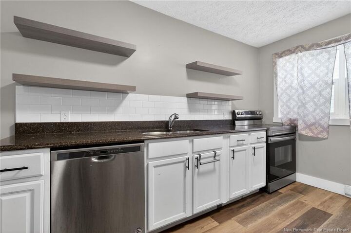 Property Photo:  319 Lutz Street  NB E1C 5G6 