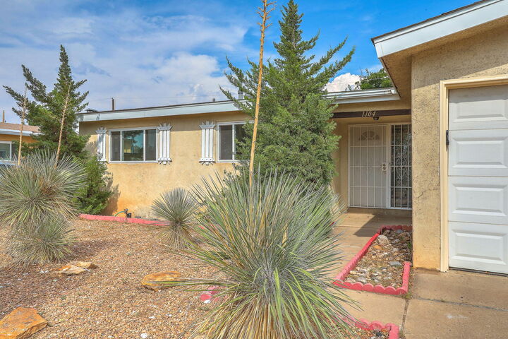 Property Photo:  1104 Alcazar Street NE  NM 87110 