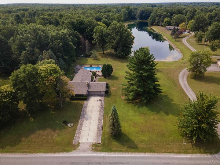 Property Photo:  21645 Swan Creek Road  MI 48637 