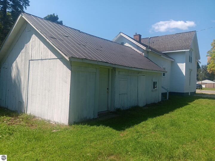 Property Photo:  220 E State Street  MI 49659 