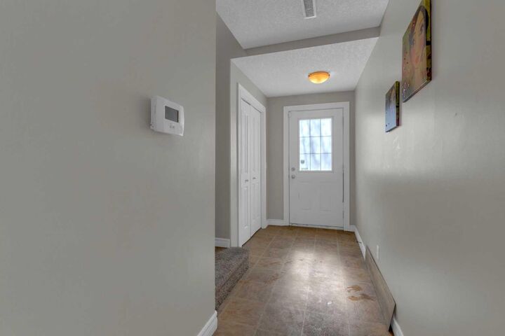 Property Photo: 10 West Cedar Rise SW AB T3H 5G8