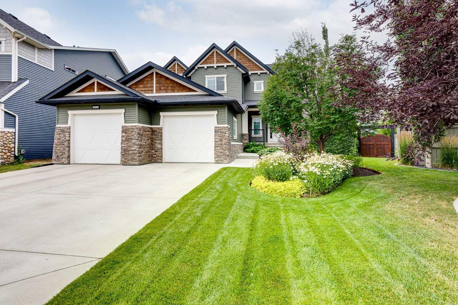 Property Photo: 126 Coopersfield Way SW AB T4B 3Y5