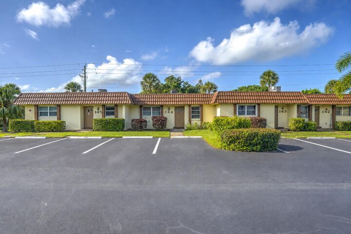 Property Photo:  5780 Fernley Drive W 144  FL 33415 