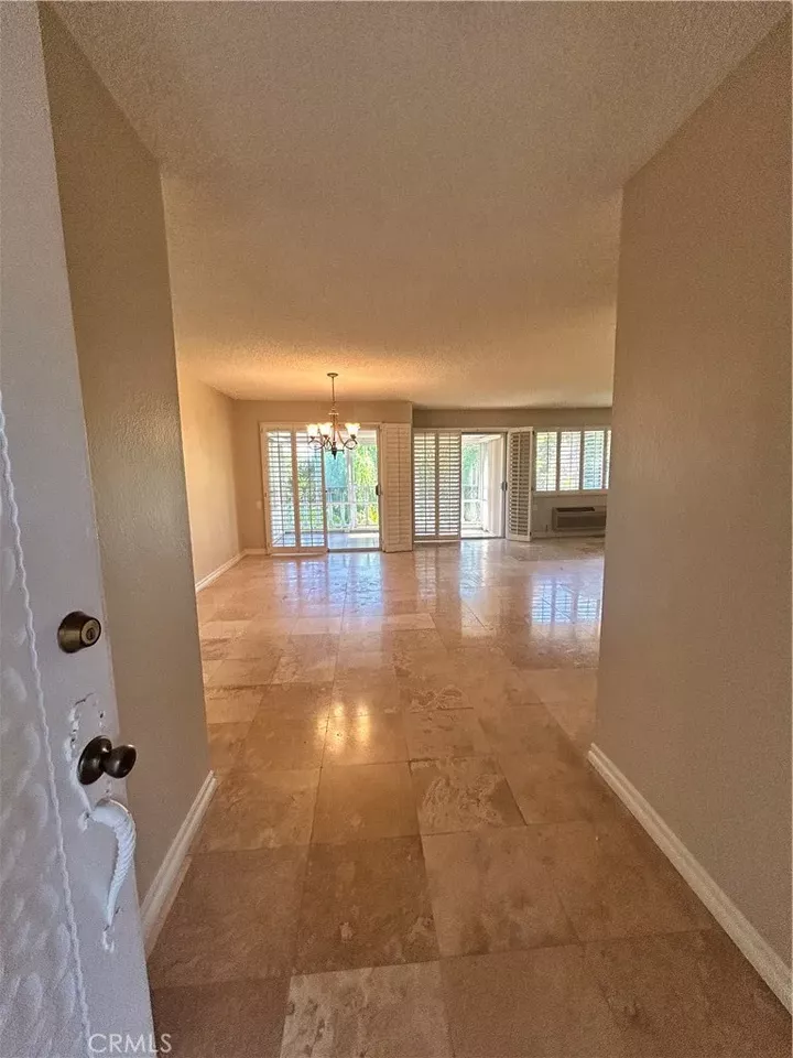 Property Photo:  2404 Via Mariposa West 3H  CA 92637 
