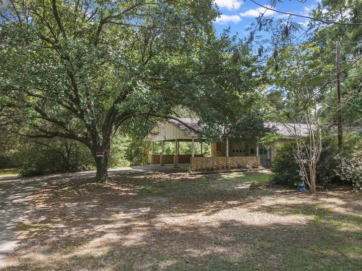 Property Photo:  506 Cr 4580  TX 77660 
