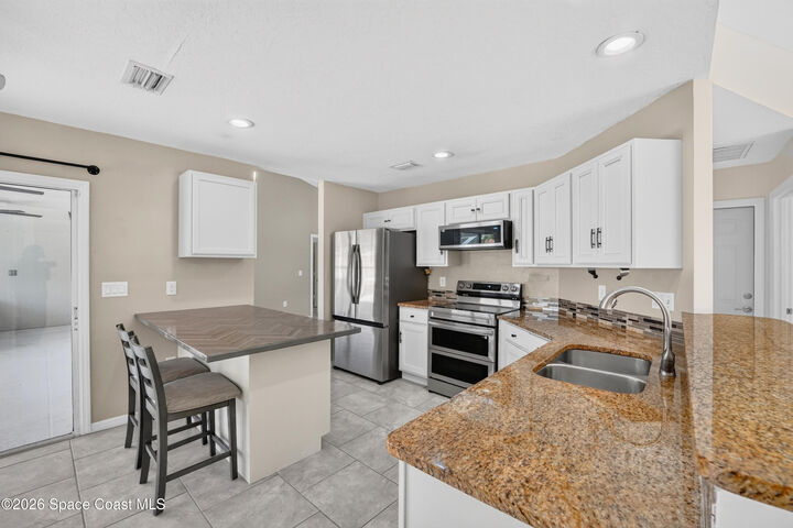 Property Photo:  772 Americana Boulevard NE  FL 32907 