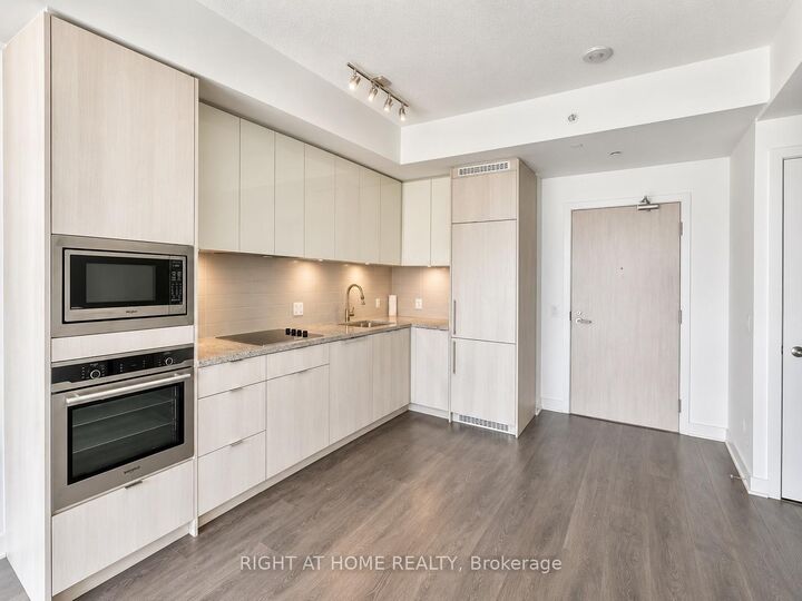 Property Photo: 115 Blue Jays Way 910 ON M5V 0N4