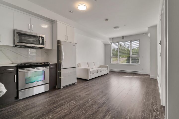 Property Photo: 9983 E Barnston Drive 214 BC V4N 6T3