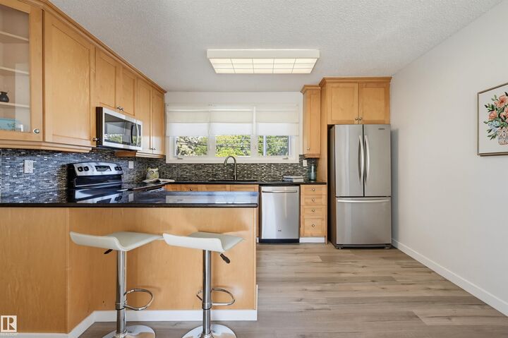 Property Photo: 9127 149 Street NW AB T5R 0A6