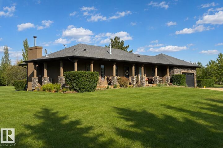 Property Photo: 56407 Rge Road 240 AB T0A 0K2