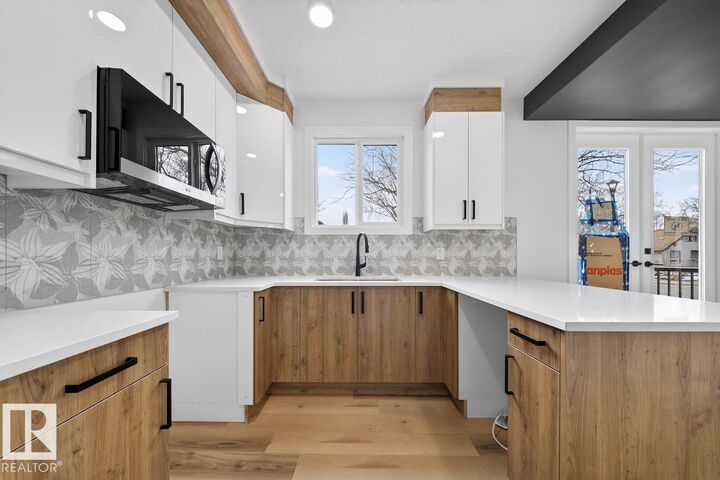 Property Photo: 6411 97 Street NW 1 Upper AB T6E 3J7