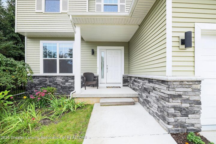 Property Photo:  6980 Abbey Lane  MI 48837 