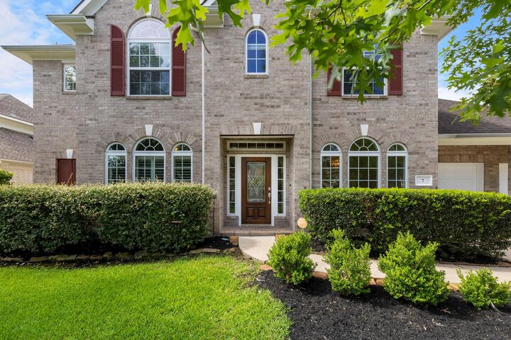 Property Photo: 7 Renoir Trail Place TX 77382