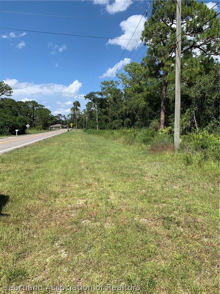 Property Photo: 9418 S Orange Blossom Boulevard FL 33875