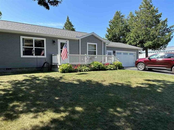 Property Photo:  451 Cadillac  MI 49701 
