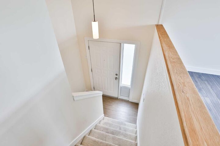 Property Photo: 304 Highlands Boulevard W 4 AB T1J 4X7