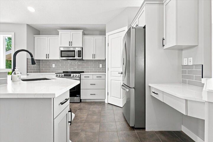 Property Photo: 10465 Royal Oaks Drive AB T8V 8L5