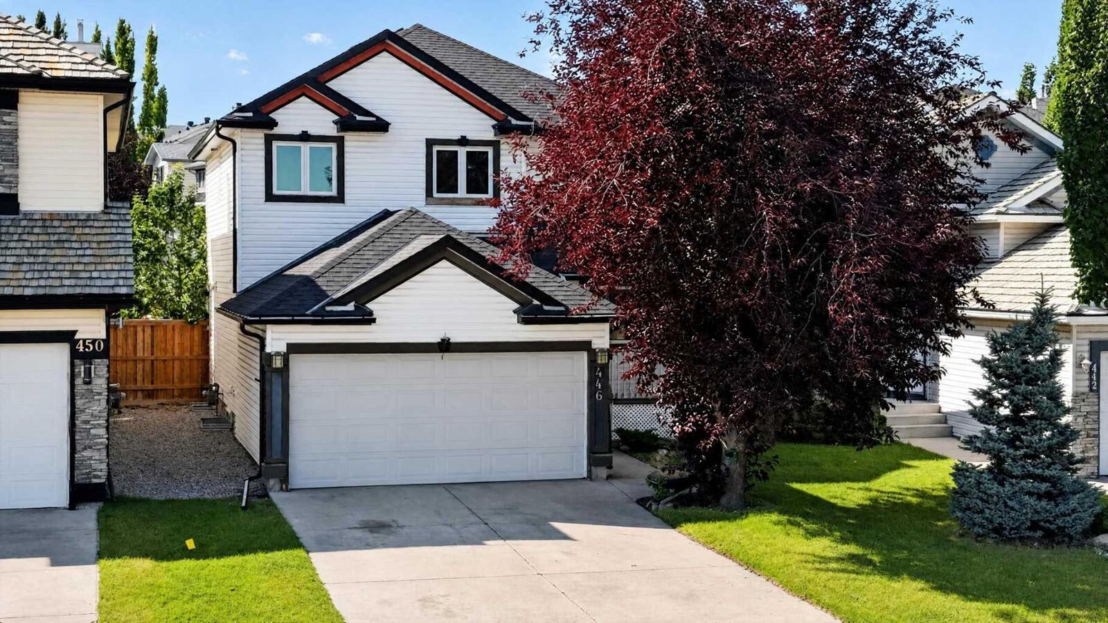 Property Photo: 446 Harvest Hills Drive NE AB T3K 4Z4