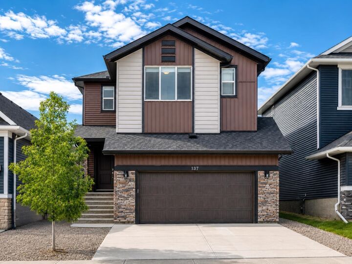 Property Photo: 137 Creekside Way SW AB T2X 4B1