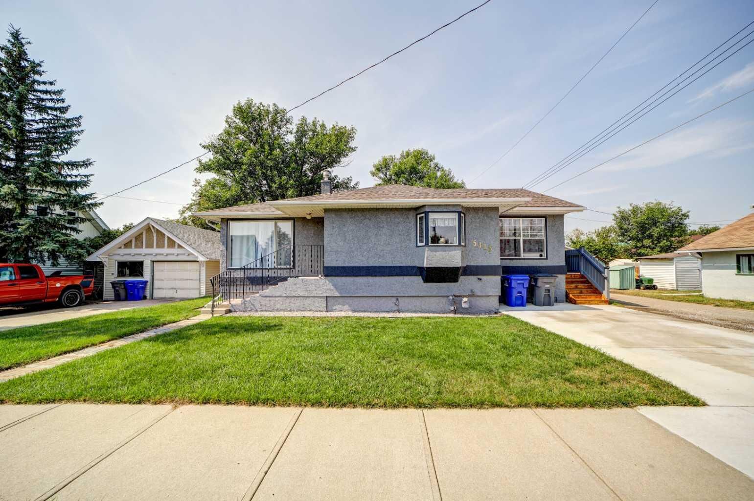 Property Photo:  5113 2 Street W  AB T0L 0T0 