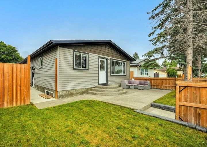 Property Photo: 896 Rundlecairn Way NE AB T1Y 2R7