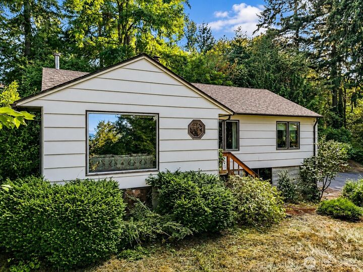 Property Photo:  7508  Woodland Avenue E  WA 98371 
