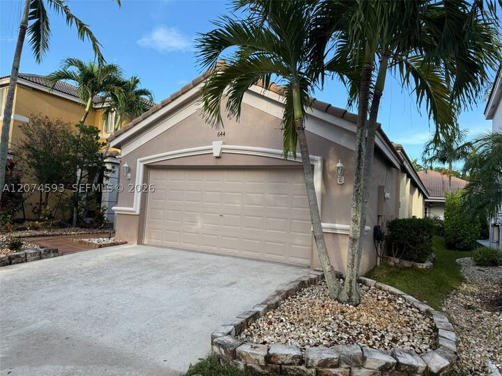 Property Photo:  644 Conservation Dr  FL 33327 