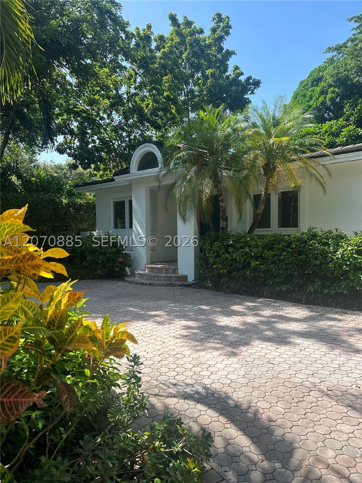 Property Photo:  3865 Poinciana Ave  FL 33133 