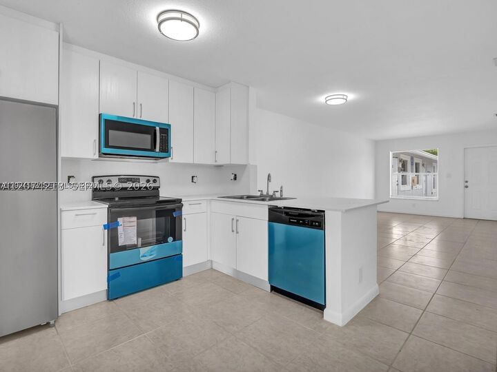 Property Photo:  241 NW 40th St 3  FL 33309 