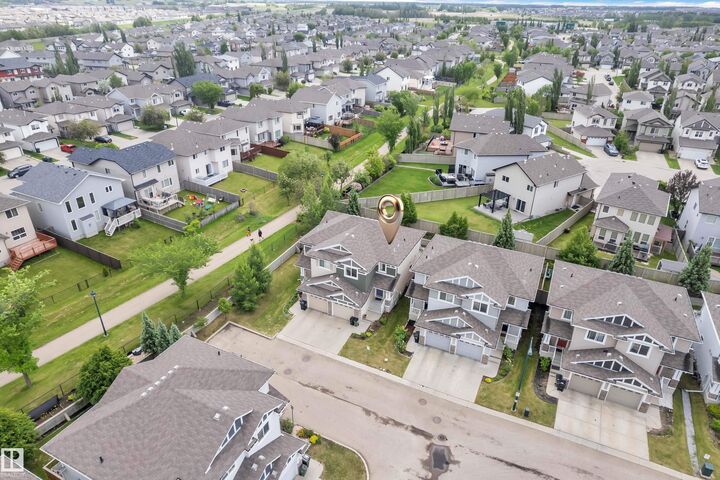 Property Photo: 655 Tamarack Road NW 24 AB T6T 0N4