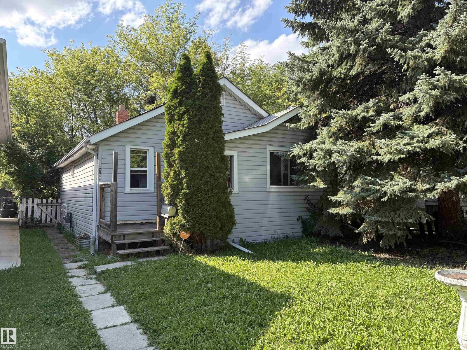 Property Photo: 12044 64 Street NW AB T5W 4J6
